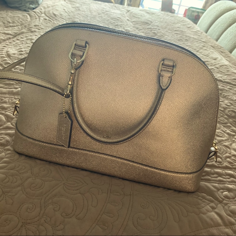 Gold metallic Coach handbag